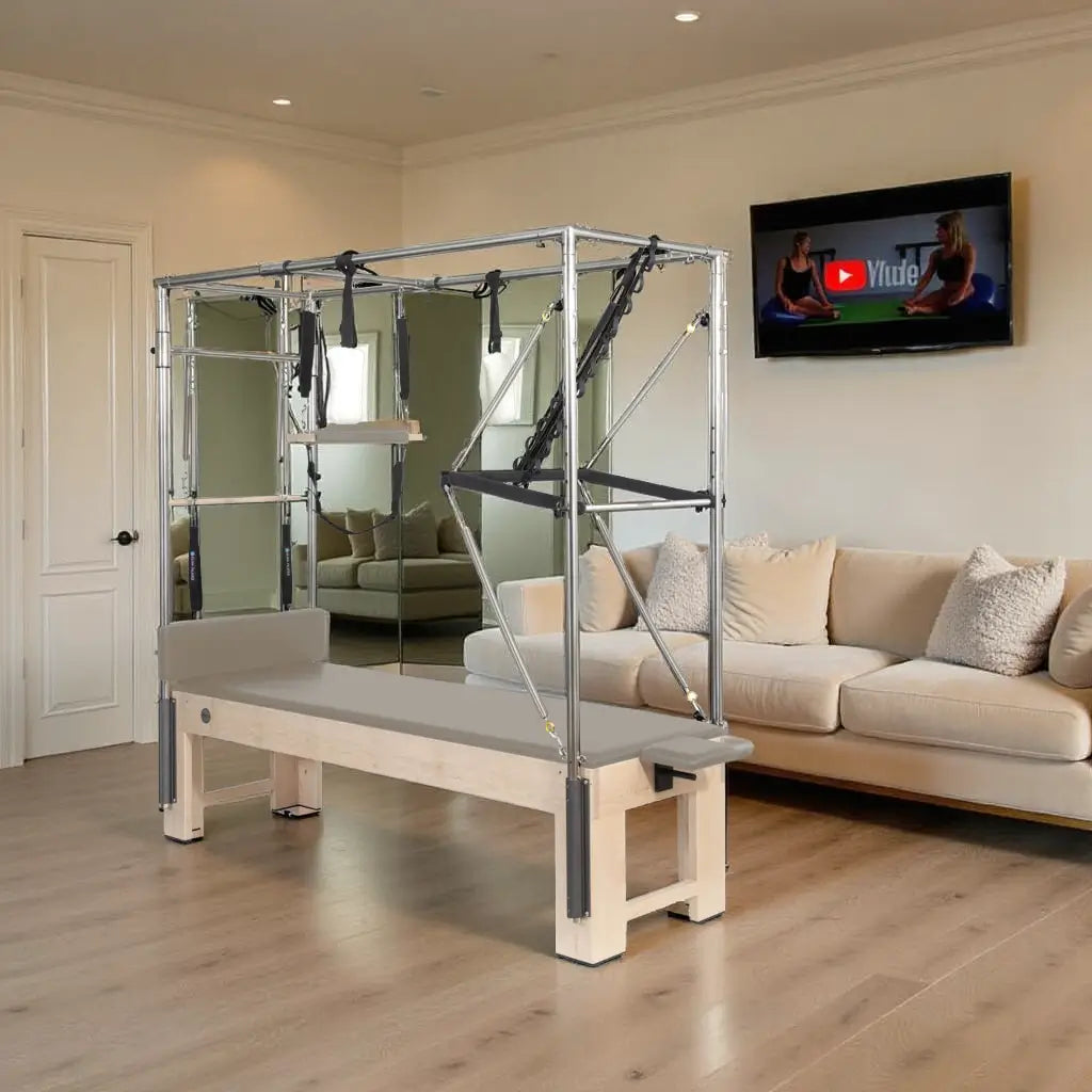 Elina Pilates Wooden Cadillac in a home living room with a sofa and wooden floor