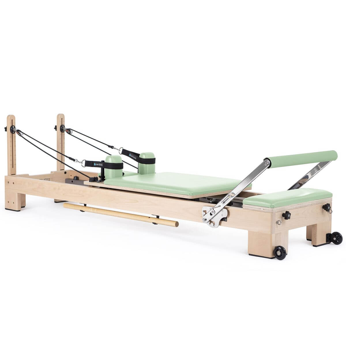 Elina Pilates Lignum Reformer in mint green upholstery, side view on a white background