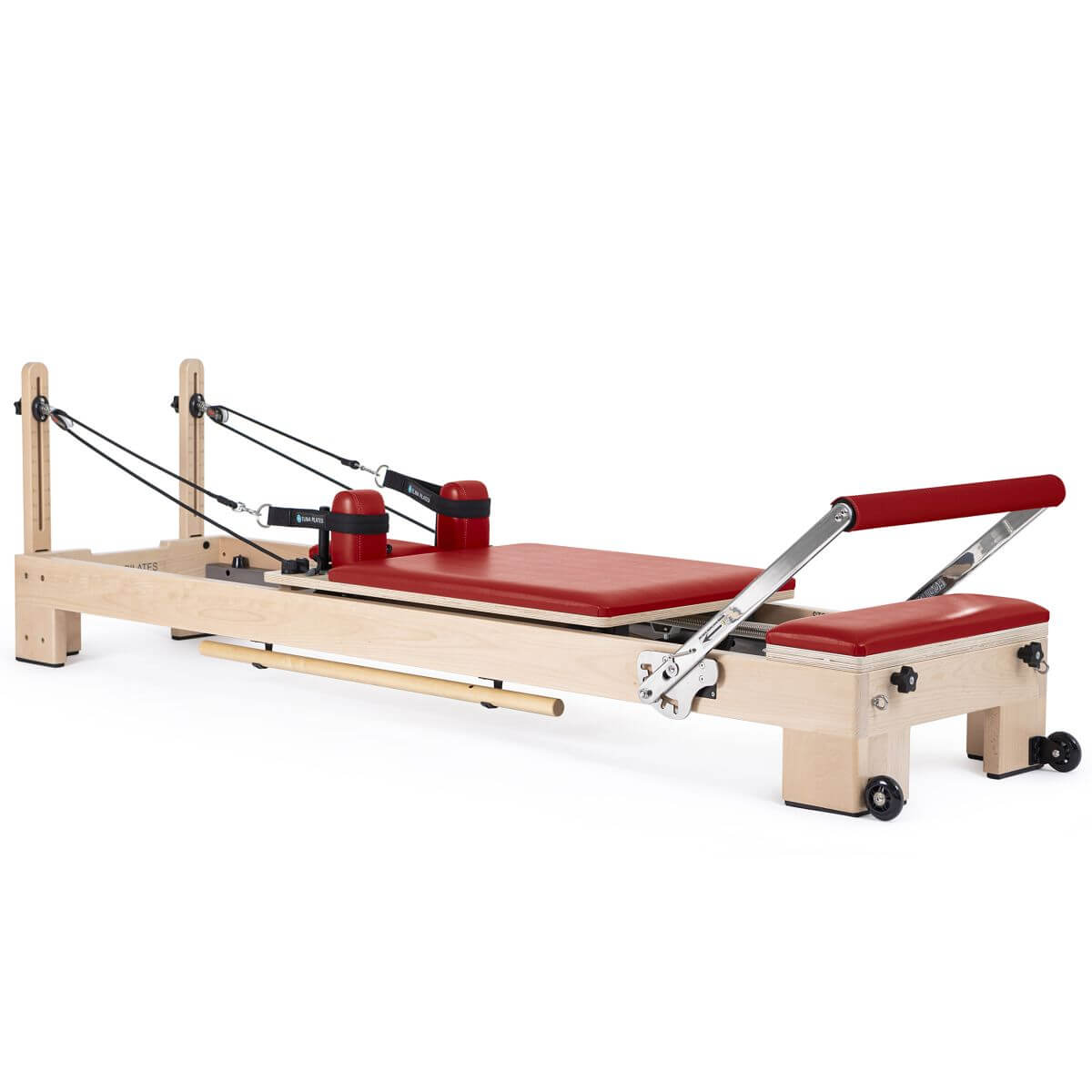 Elina Pilates Lignum Reformer in red upholstery, side view on a white background