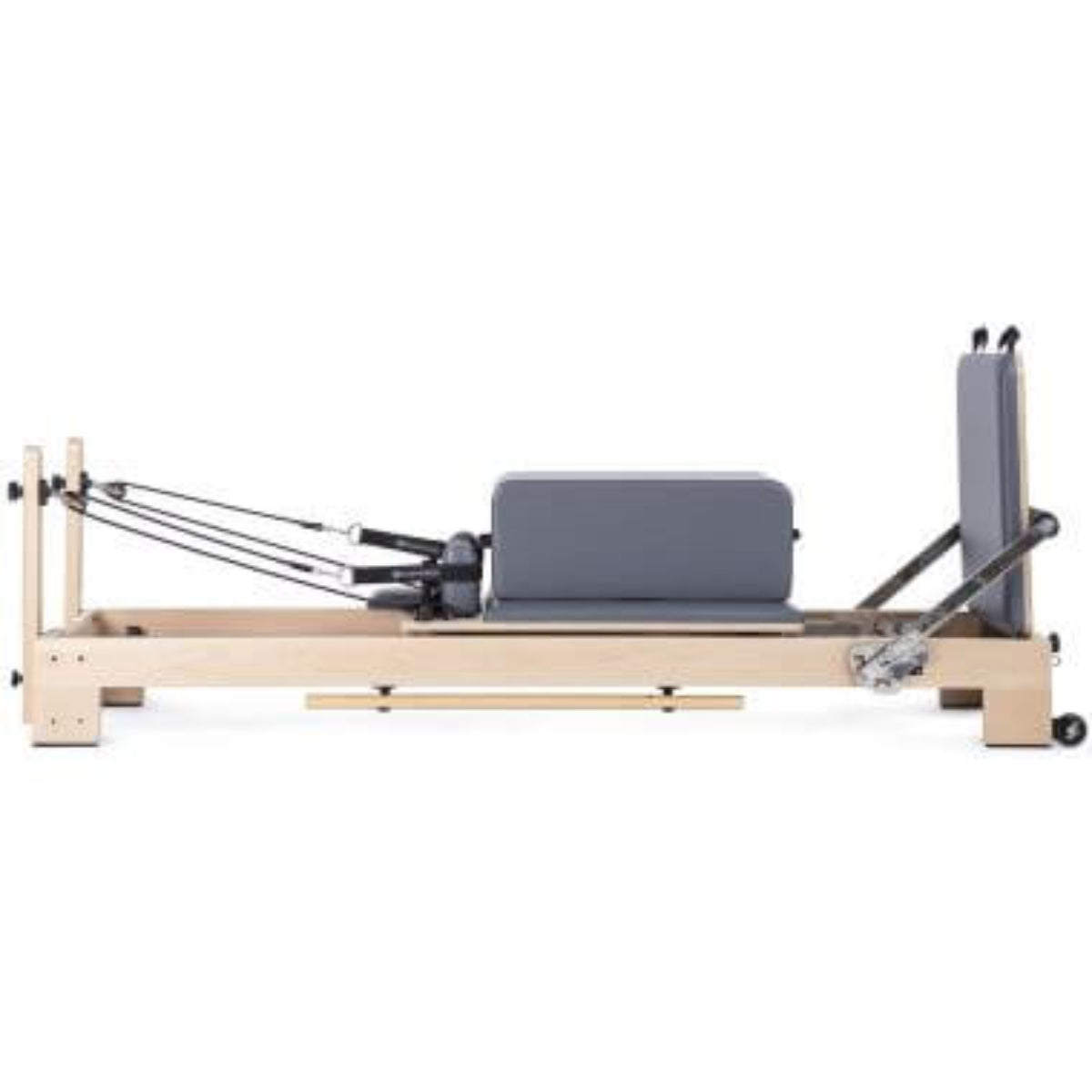 Elina Pilates Lignum Reformer with a grey sitting box on the carriage, side view