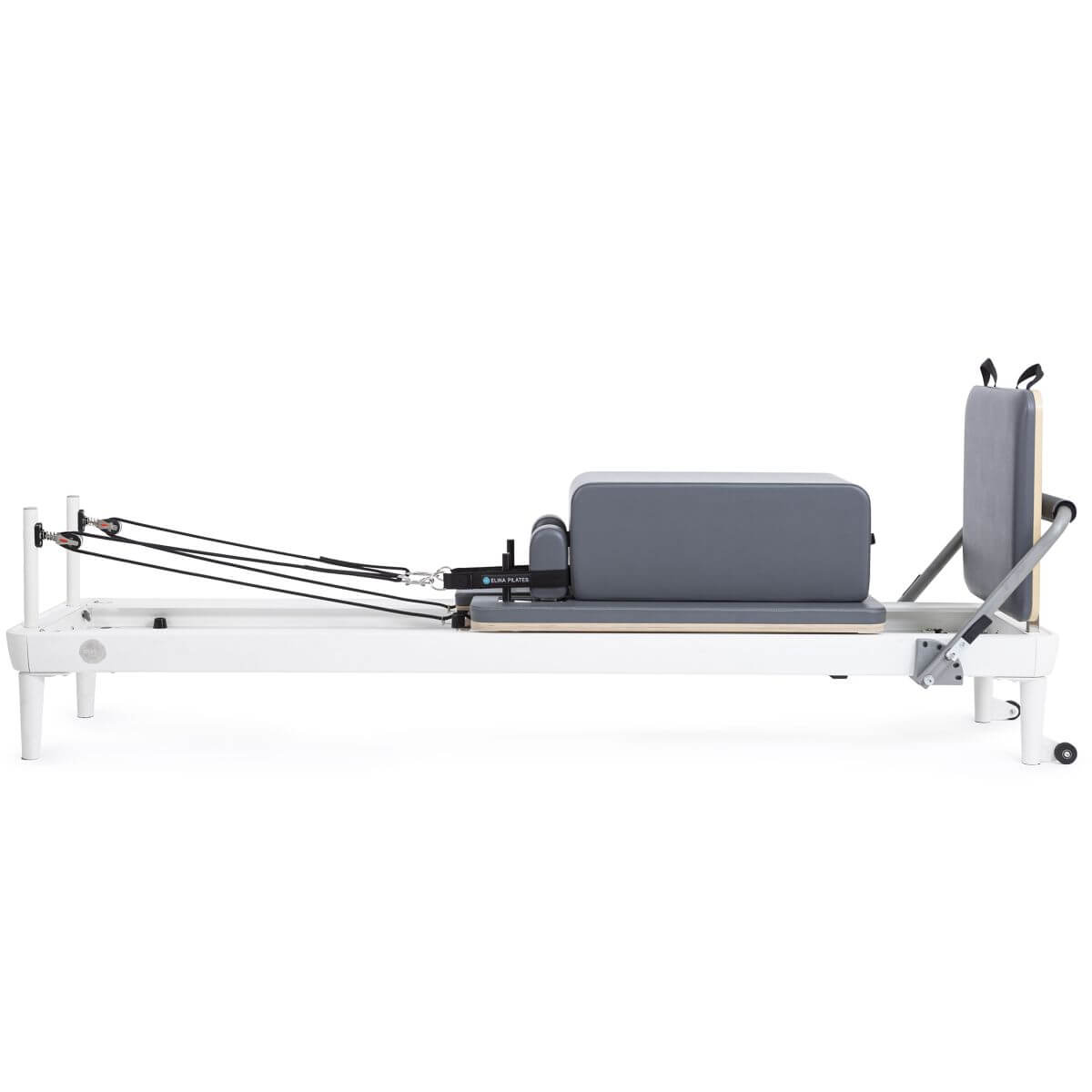 Elina Pilates Nubium Reformer with a grey sitting box on the carriage, side view