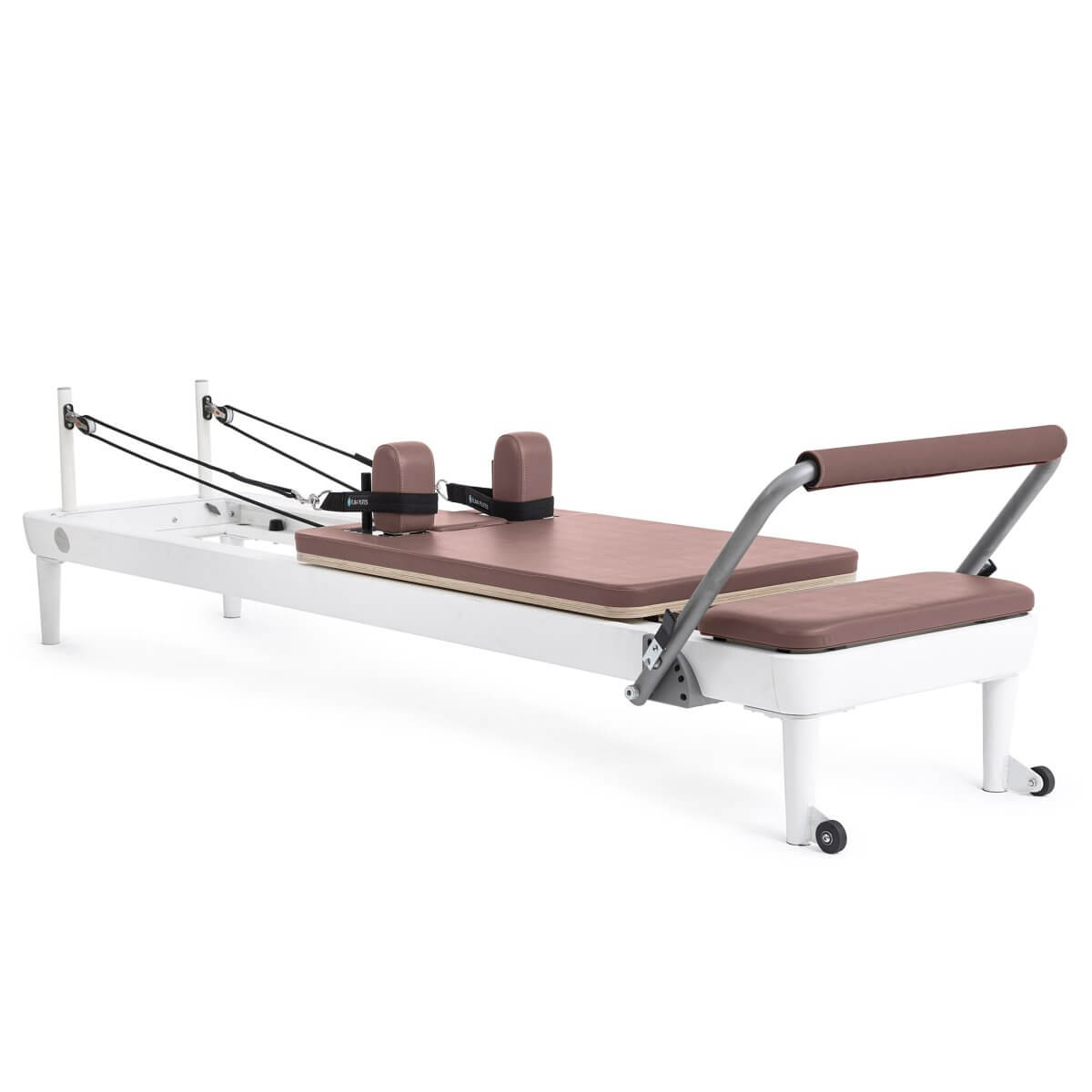 Elina Pilates Nubium Reformer with white frame and dusty rose upholstery, side view
