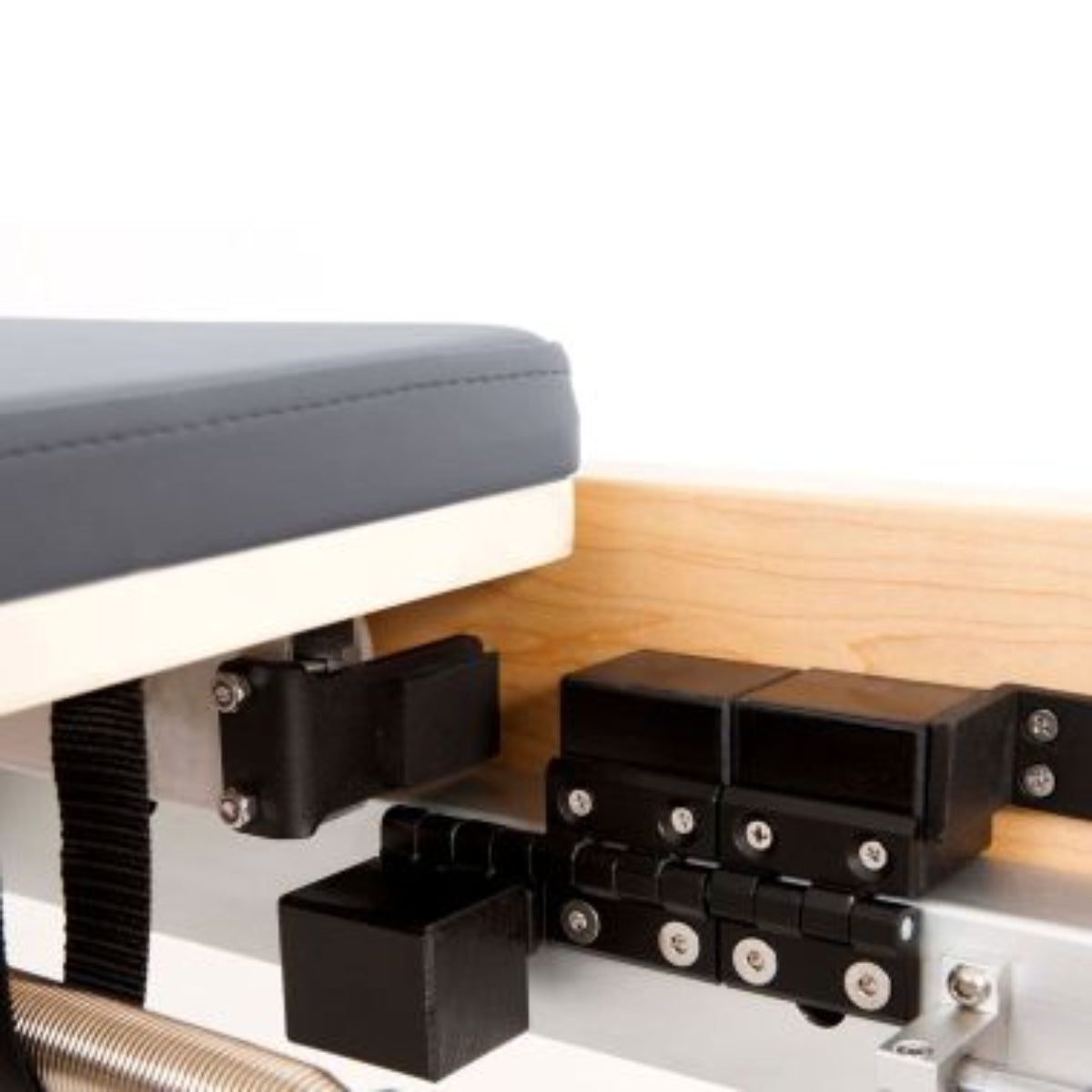 Close-up of the carriage and spring box on the Elina Pilates Wooden Reformer