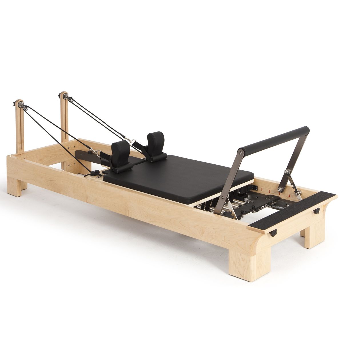 Elina Pilates Wooden Reformer with black upholstery, angled view on a white background