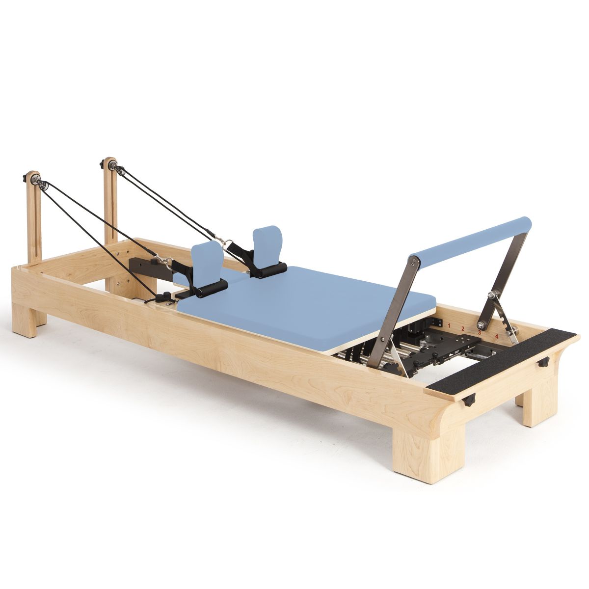 Elina Pilates Wooden Reformer with light blue upholstery, angled view on a white background